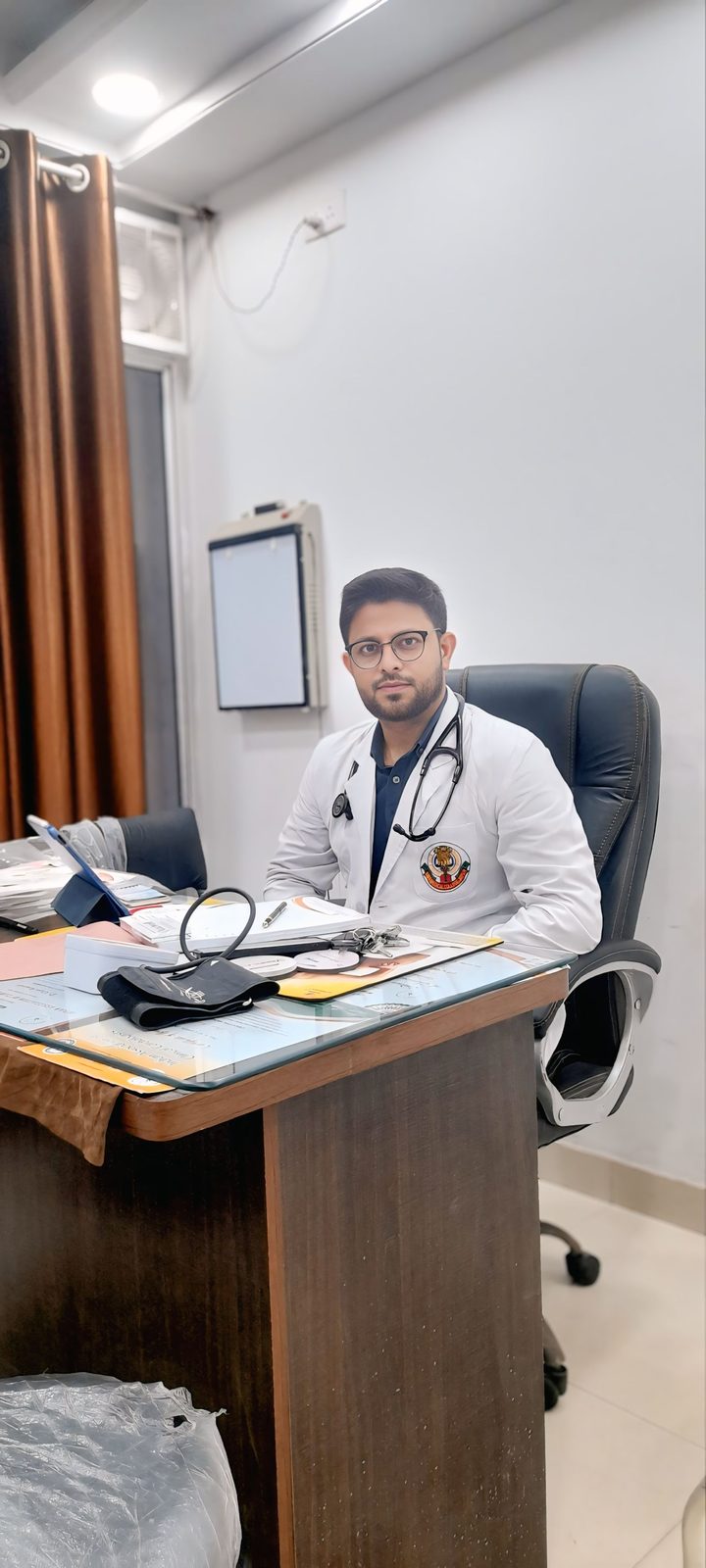 Dr. Arif Khan at his consultation desk